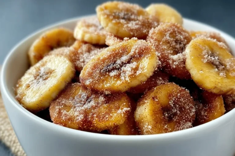 Crispy cinnamon sugar banana chips in a bowl, perfect for a healthy snack.